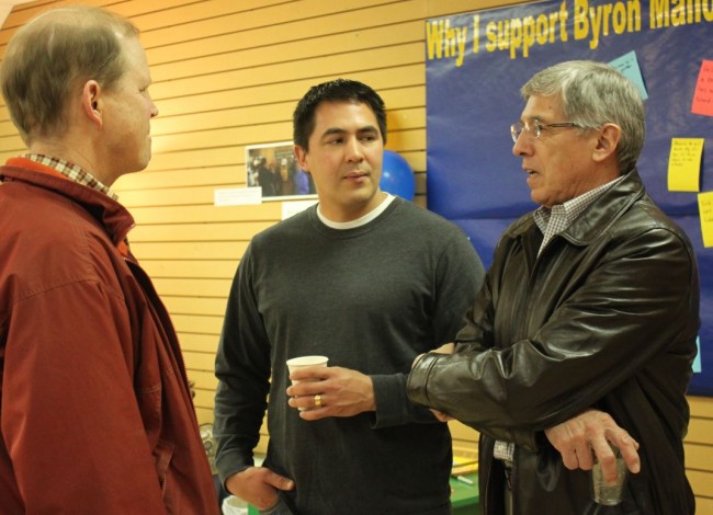 Byron Mallott, right, mingles with visitors at the open house of his campaign headquarters in Juneau. Mallott will leave Sealaska's board of directors next month to concentrate of his race for governor. (Lisa Phu/KTOO)