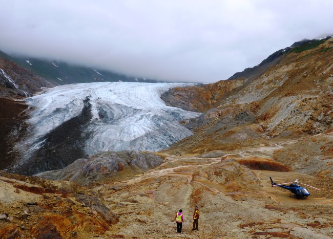 Oxidized rock colors a valley where one of Seabridge Gold's KSM Project's open pit mines will be dug. Canadian officials have opened their final comment period before environmental approval. (Ed Schoenfeld/CoastAlaska)