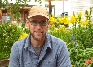 Kevin Koch, a fisheries biologists with the Gitanyow (First Nation) Fisheries Authority, poses neak the Skeena River in Old Hazelton, B.C. (Ed Schoenfeld, CoastAlaska News)