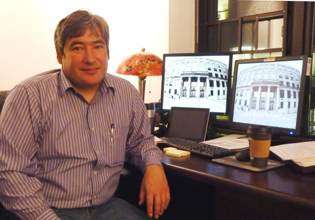Rep. Sam Kito III poses at his desk in the Capitol Jan. 7, 2015. This is Kito's first full session. He was appointed last February