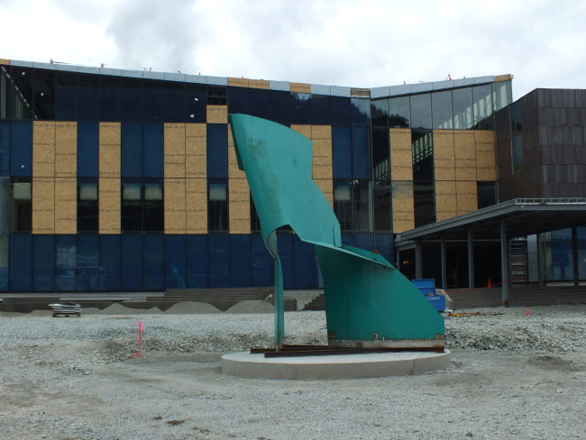 Nimbus was turned so the arch would be visible from the street when it was placed on a new, round concrete pad in front of SLAM. (Photo by Matt Miller/KTOO)