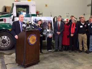 Gov. Bill Walker unveils his 2016 budget plan Wednesday, Dec. 9. (Photo by Rachel Waldholz/APRN)