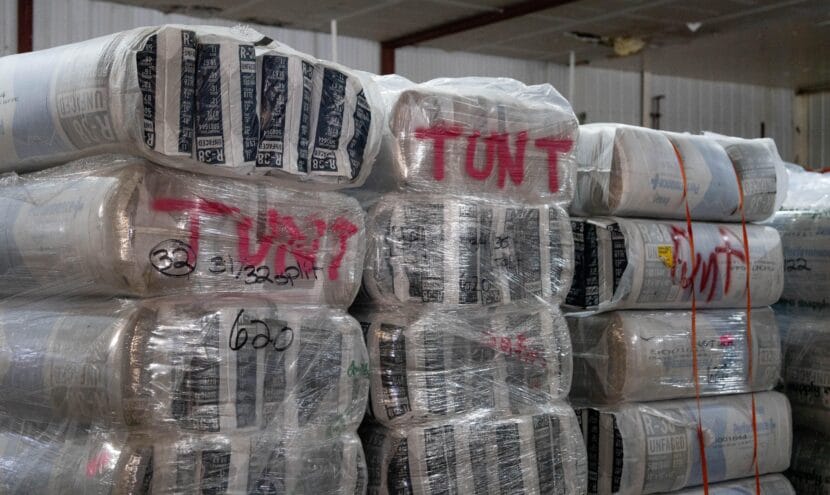 Bundles of insulation are staged in a warehouse and marked for delivery to Tuntutuliak, one of the villages impacted by ex-typhoon Halong, in Bethel on Nov. 7, 2025.